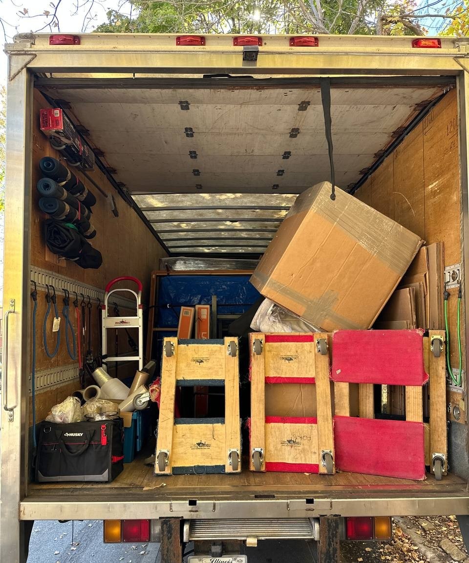 Moving truck with equipment and dollies