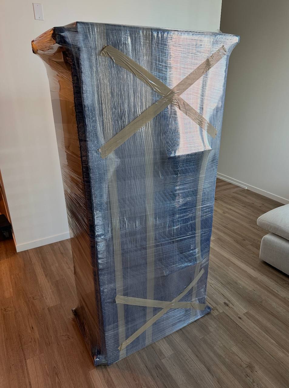 Wrapped wooden cabinet