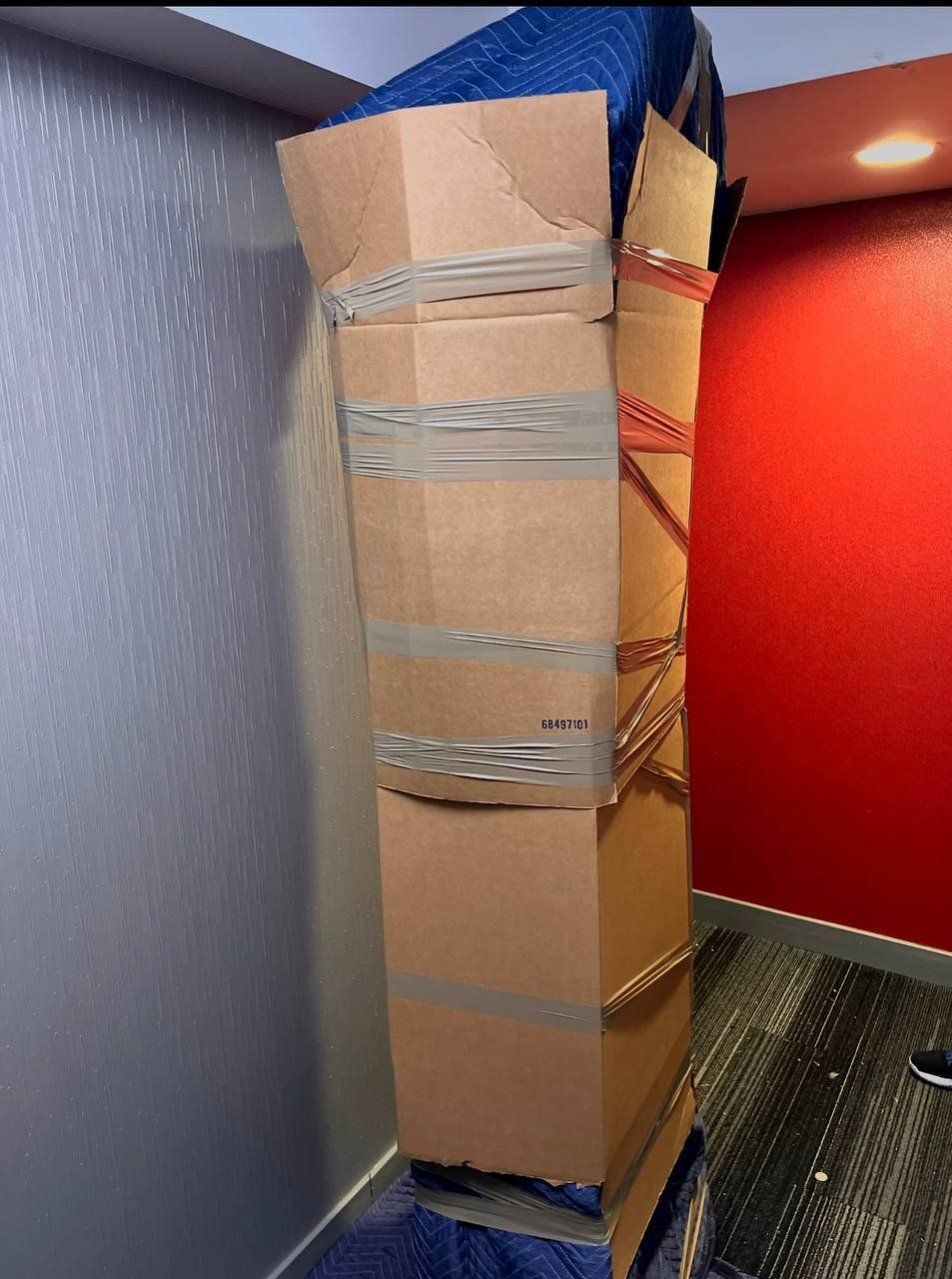 Tall wrapped furniture in office