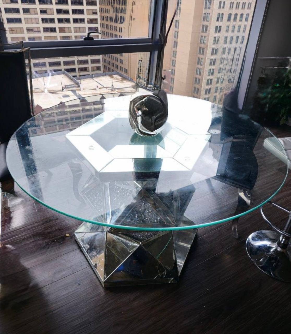 Glass dining table in high-rise apartment