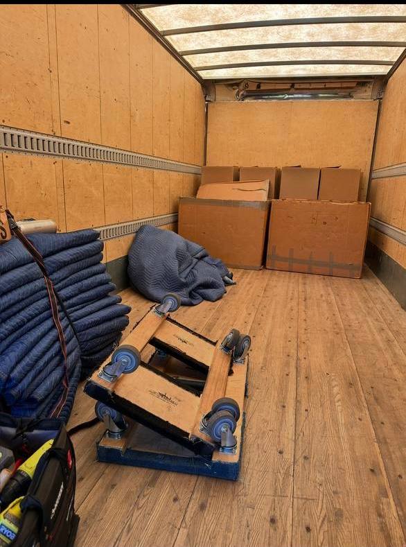 Moving truck with equipment and boxes