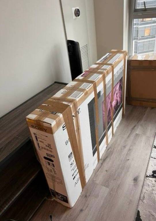 Sony TV box wrapped for moving