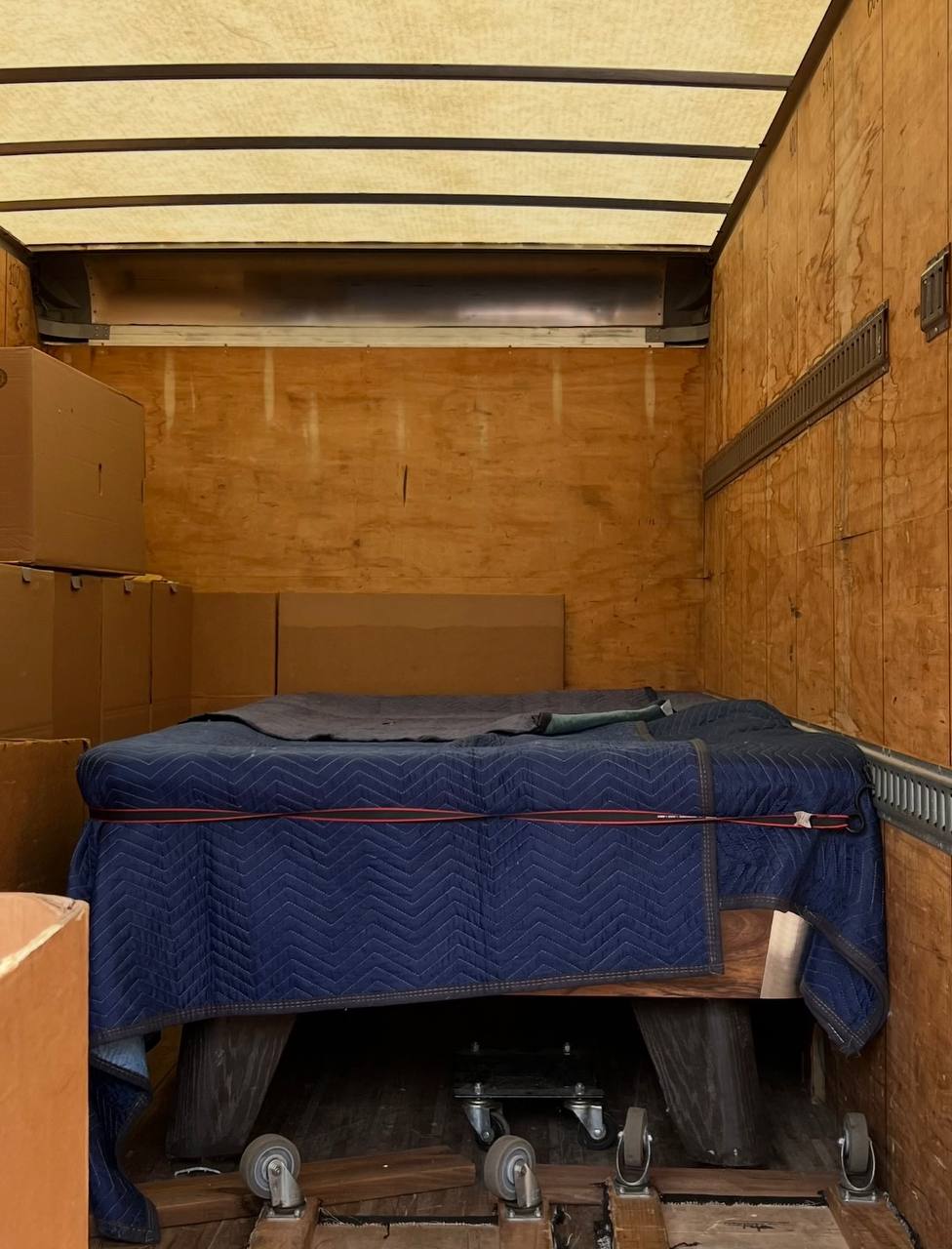 Pool table wrapped in moving truck