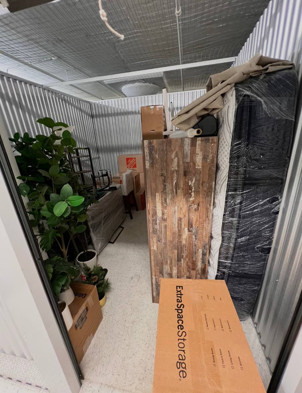 Storage unit with furniture and plants